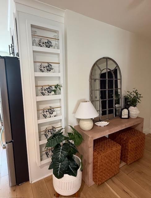 Built-in plate rack styled with black and white botanical china